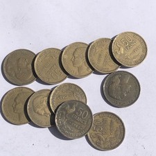 11  pièces 50 francs