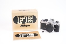 Appareil photo Nikon FE noir #33339249. Objectif AF Micro Nikkor f/2.8 - 60mm D