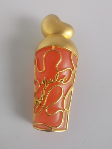 Broche dorée deci - dela, nina