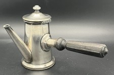 Chocolatière en métal argenté à poignée en bois noirci, poinçonnée XXème