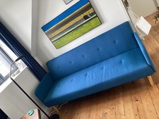 Canapé en tissu bleu 3 places, couchage d'appoint 1 place