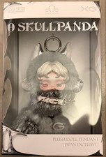 Pendentif poupée peluche