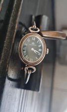 ancienne montre jonc mécanique BUCHERER en argent massif sterling poinçonnée