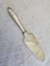 Pelle à tarte coupante