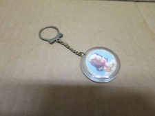 POUPEE GEGE porte clé publicItaire MILY