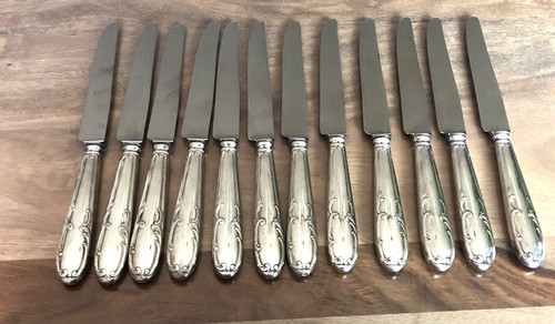 Couteaux métal argenté - 12,