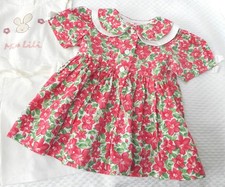 ? Robe longue à fleurs bébé marque  Baby Love taille 6 mois ?
