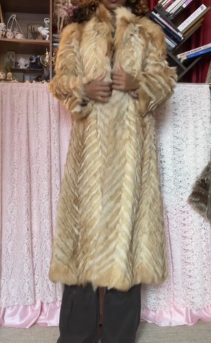 Manteau long femme fourrure