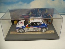 DIORAMA STYLE ROUTE BLEUE LA PEUGEOT 306 MAXI RALLYE boite vitrine  1/43