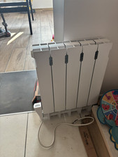 Radiateur électrique à inertie fluide Delonghi 1000w « Versilia »