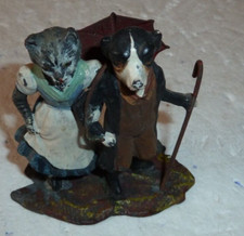 beau plomb de vienne ou de Nuremberg figurant un couple chien et chat humanisé