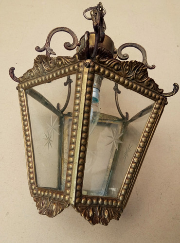 Ancienne lanterne faces en - faces,