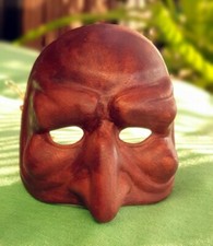 Masque vénitien décoratif mural en terre cuite. 