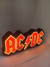 Logo Figurine AC DC, Lumière