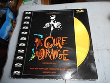 The Cure in orange  Cd Video laser disc etat correct