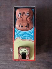 Jouet ancien en tôle Tirelire