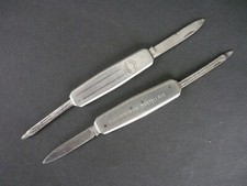 2 anciens couteaux ongliers publicitaires-Champagnes De Castellane, Duval Leroy.