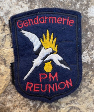 353d ANCIEN INSIGNE GENDARMERIE PM RÉUNION.