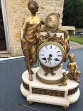 BELLE PENDULE EN BRONZE DORE