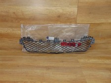 Cache calandre central de