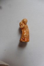 Fève ancienne en porcelaine