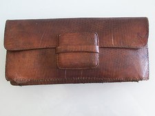 Ancienne pochette en cuir. Ancienne pochette en cuir