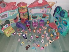 Lot de 40 petshops et 2 maison +accessoire 