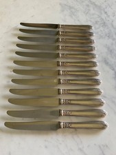 coffret 12 couteaux métal argenté . Levert Orfèvre