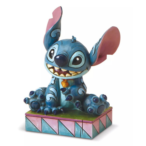 Disney traditions statue - disney,