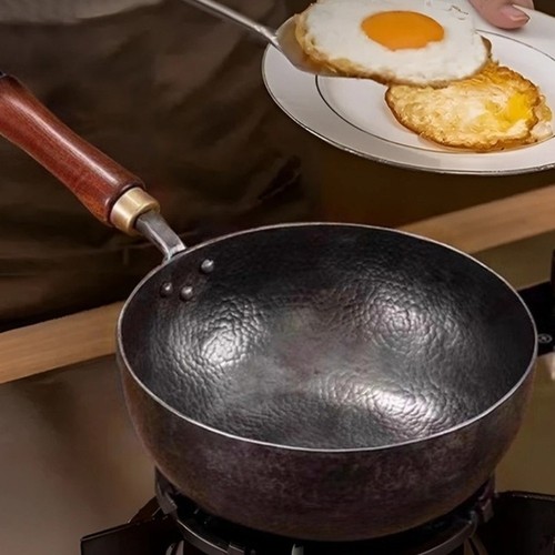 Wok fonte forgé main - en,