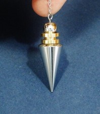 *° PENDULE  EN LAITON CHROME