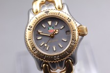 [Presque comme neuf] ÉTIQUETTE HEUER S/el S95.208M lunette dorée quartz...