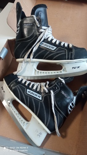 Vends paire patins glace - à,