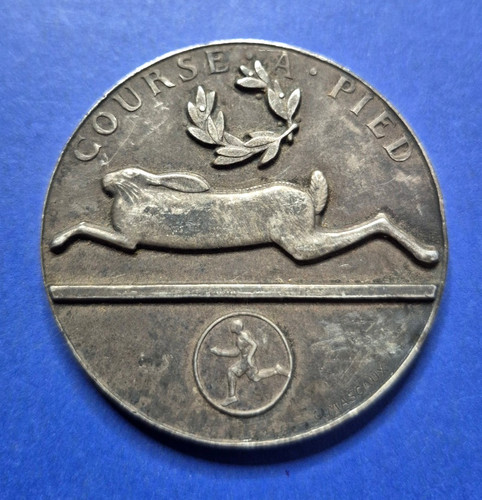 Médaille course pieds - à,