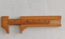 ANCIEN PETIT PIED A COULISSE POUR LA MESURE DES BOUTONS