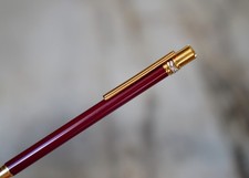 MAGNIFIQUE STYLO BILLE MUST CARTIER TRINITY LAQUE BORDEAUX & PL. OR 18 CARATS