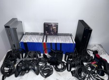 Lot : 2 Consoles PS2 + Jeux + Accessoires 