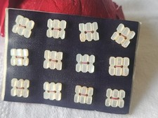 Rare  plaque lot 12 boutons