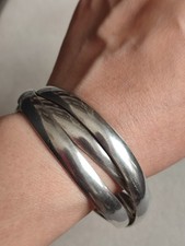 Jonc Vintage Bracelet 3 anneaux entrelacés en métal argenté, début XXème.