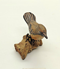 sculpture oiseau en bois sur