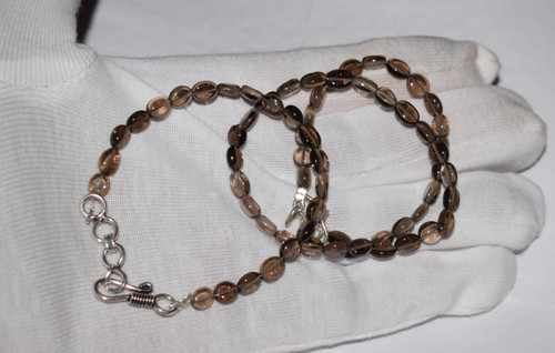Collier bracelet fait - , main