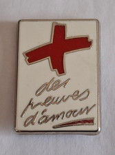 PIN'S ARTHUS BERTRAND -  Don sang. Preuves d'amour vertical blanc