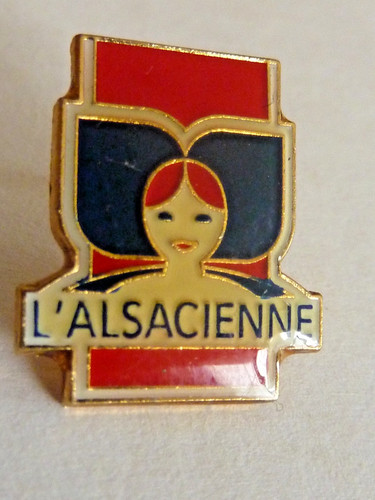 Pin pins badge l alsacienne - pin's, l'alsacienne
