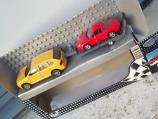 Deux Porche Cayenne et 911 sur