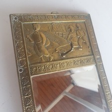 Miroir ancien avec verre biseauté tour cuivre et décor main circa 1930