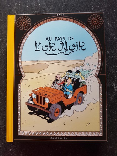 Tintin pays or - au, l