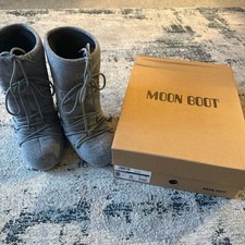 Grey felt high moon boots with