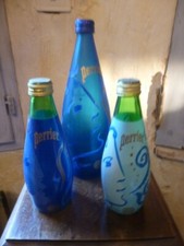 trois Bouteilles Collector Perrier 2000 - une de 75 cl et deux de 33cl - vides