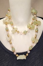 carlo zini  ITALY collier sautoir vert pierrre jade? jadeite en formes d'animaux