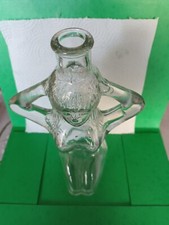 Erotique, bouteille transparente femme nue